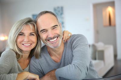 man and woman smiling 