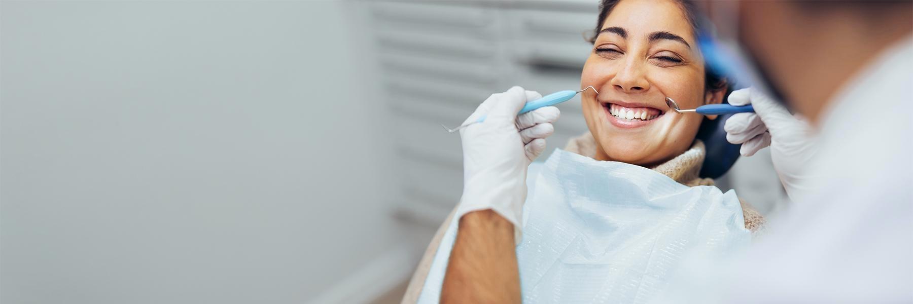 woman getting dental extractions in roanoke virginia